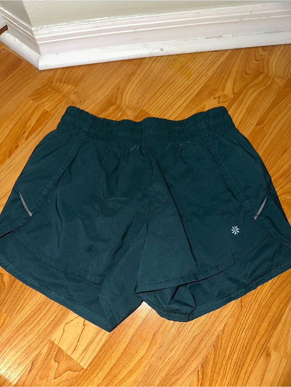 Dark Teal Athletic Shorts with Reflective Detail athleta